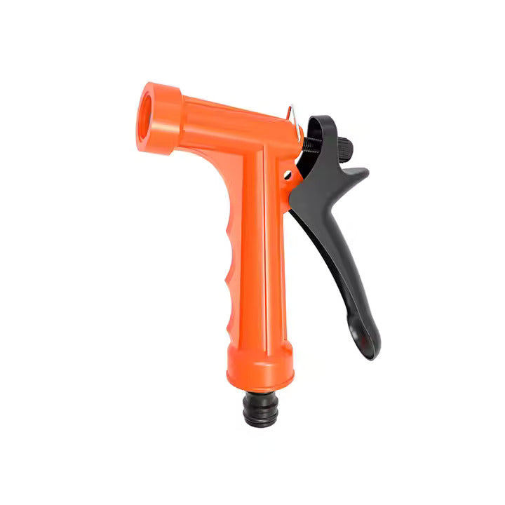 Garden hose nozzle spraying adjustable water pattern