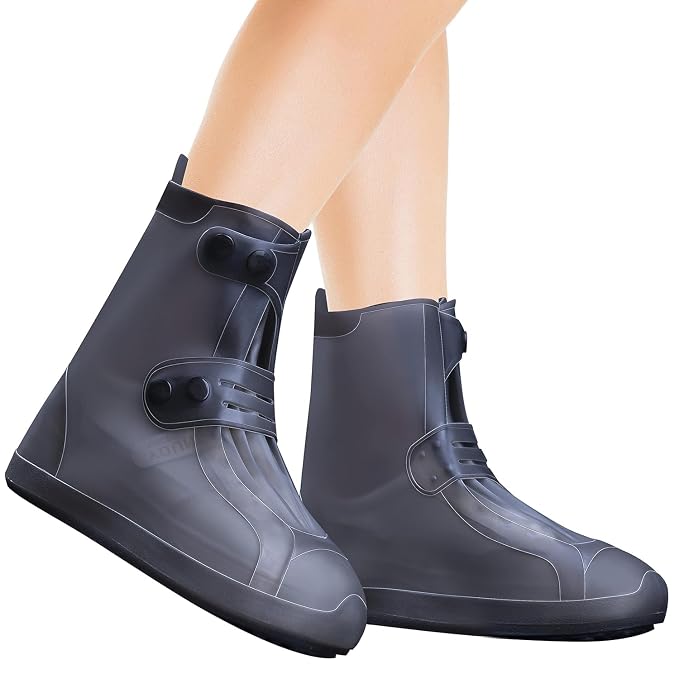 Rain shoe covers worn over regular shoes in rain